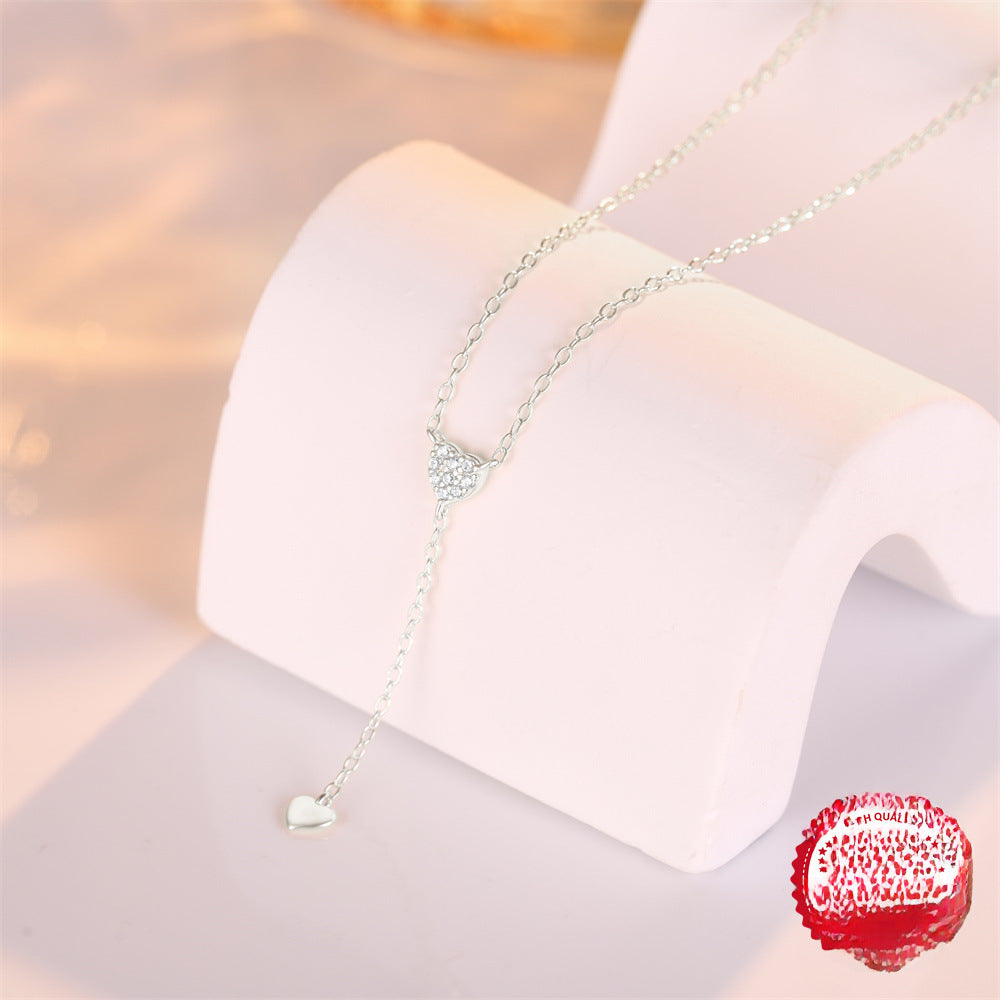 Pure silver tassel Y-shaped double-heart diamond-encrusted collarbone chain, a high-end and elegant necklace accessory