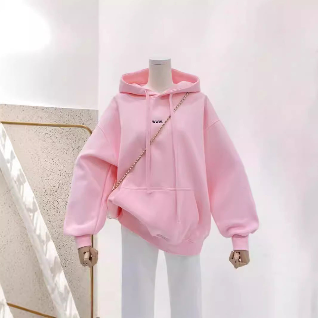 A loose pink hooded sweatshirt for women