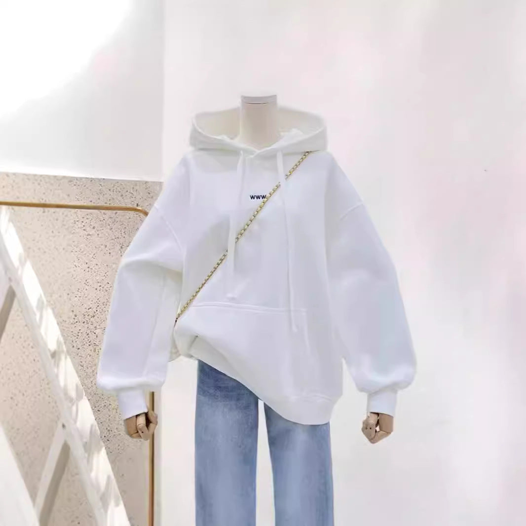 A loose pink hooded sweatshirt for women