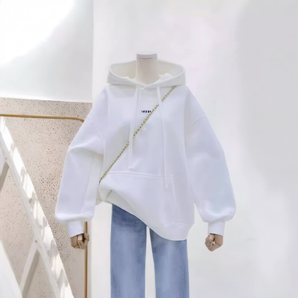 A loose pink hooded sweatshirt for women