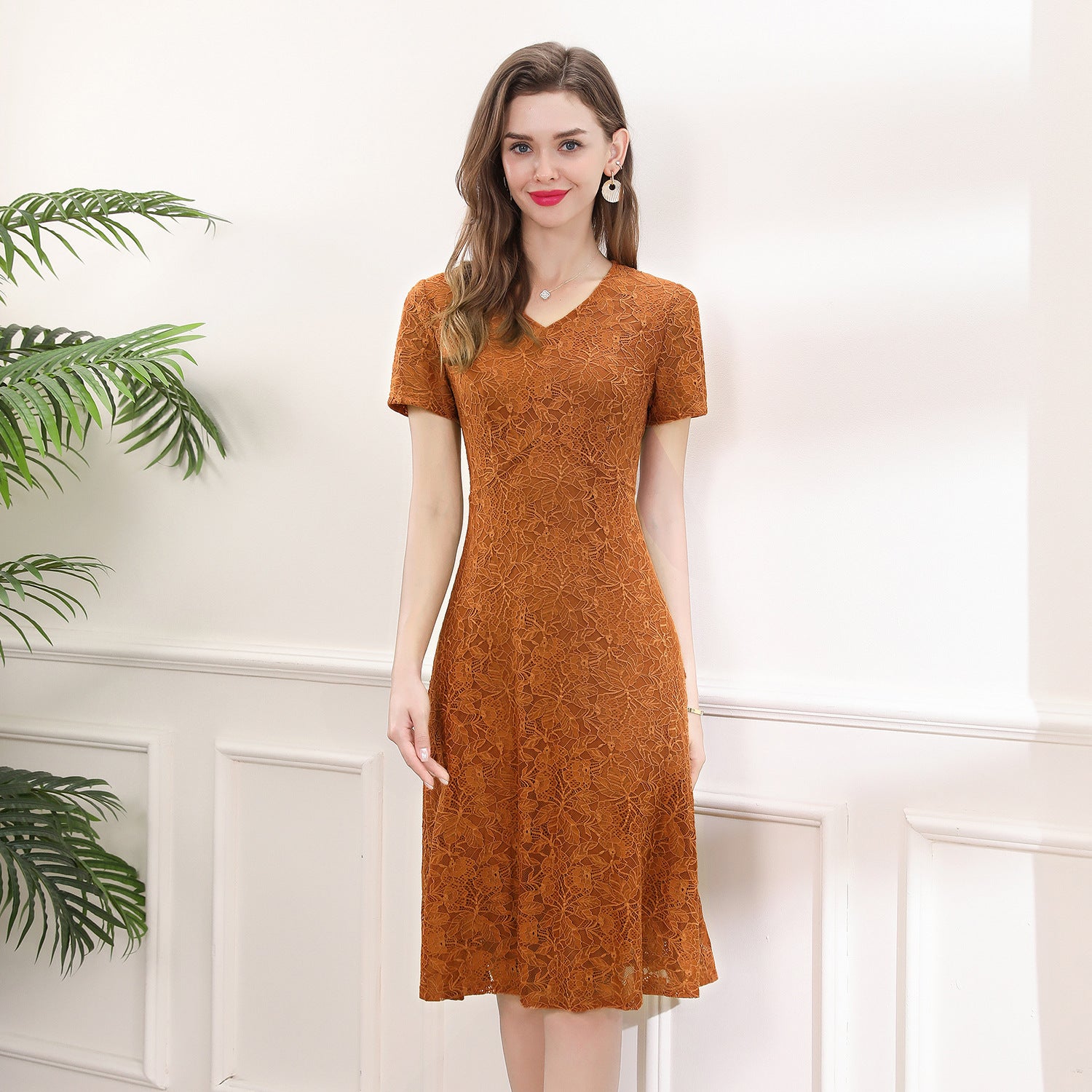 A figure-hugging lace dress
