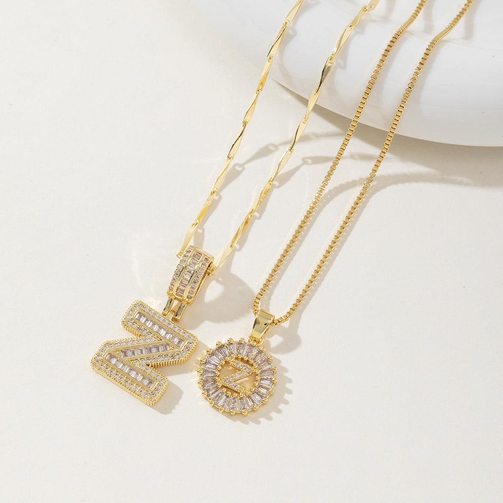 A 26-letter zirconia pendant inlaid with rock sugar copper