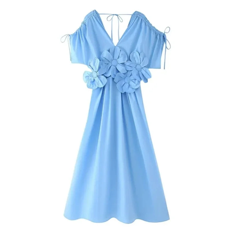 A waist-cinched lace-up three-dimensional flower bow vacation dress