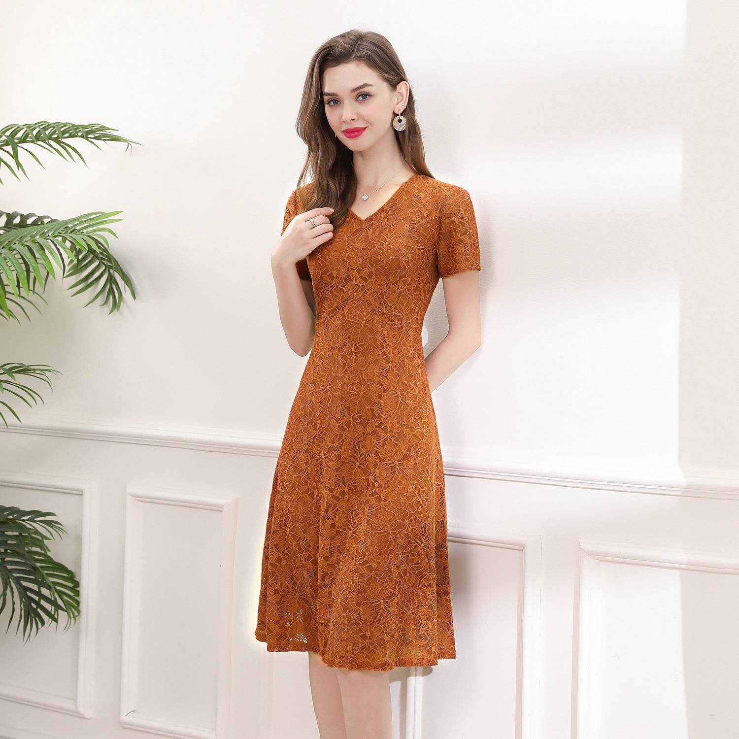 A figure-hugging lace dress