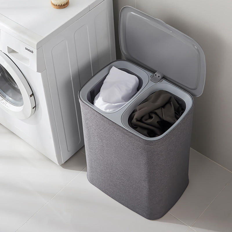 A covered dirty clothes basket