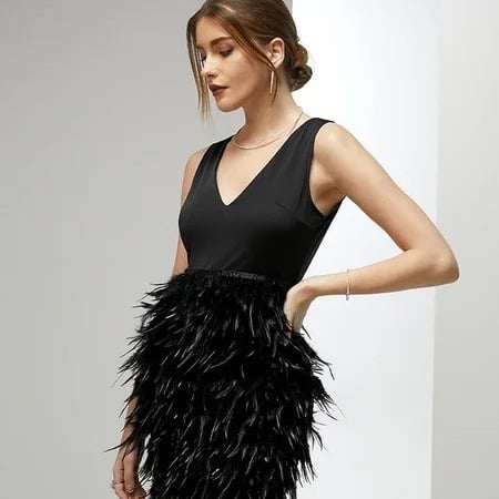 Sleeveless vest and fluffy lace-up dres