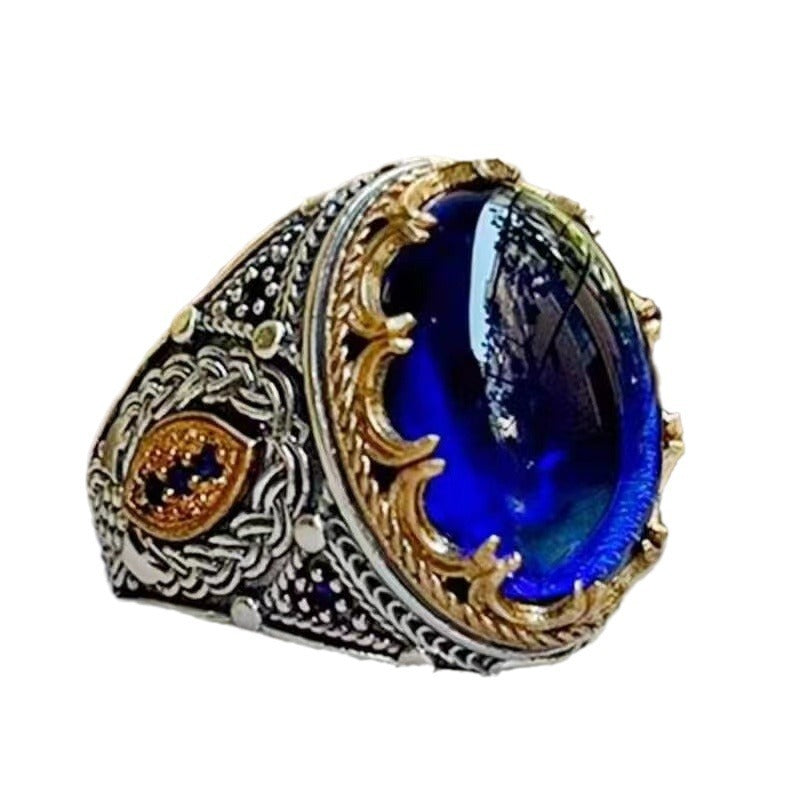 Diamond-encrusted blue gemstone carved ring