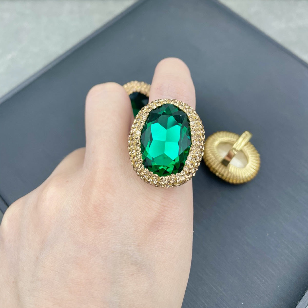 The crystal ring is emerald green