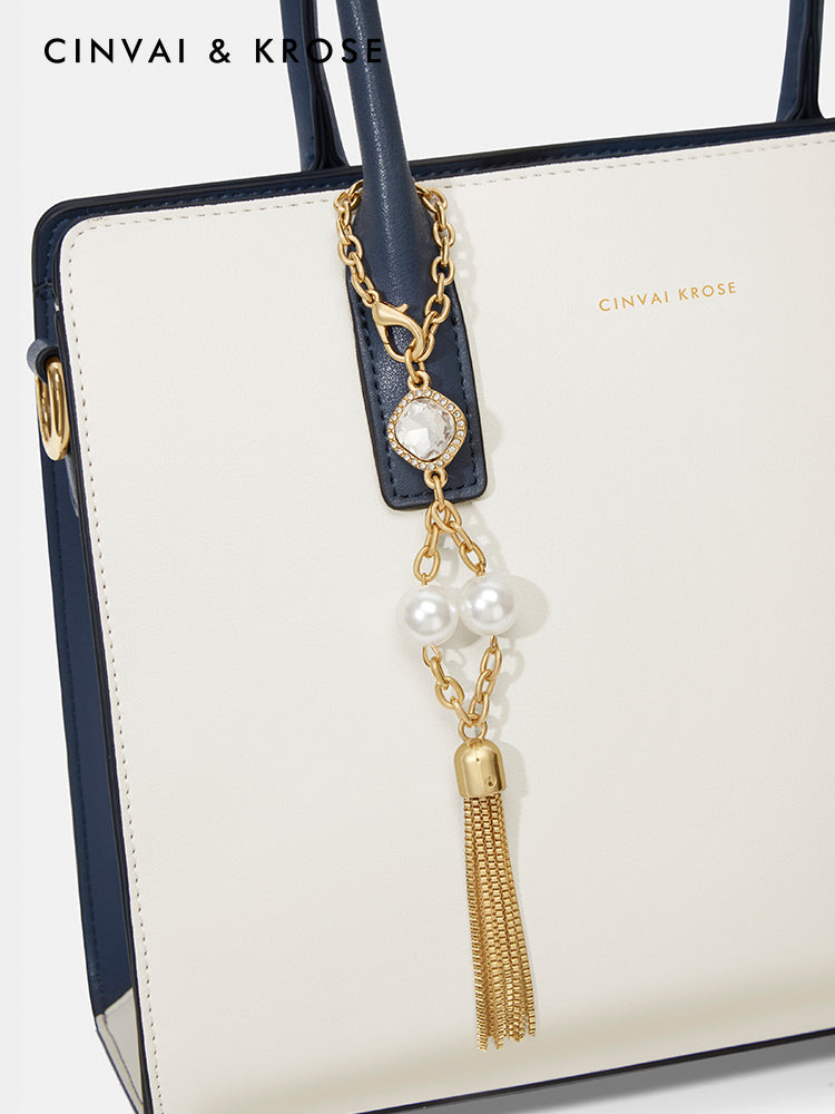 Hand-held shoulder-sling bag
