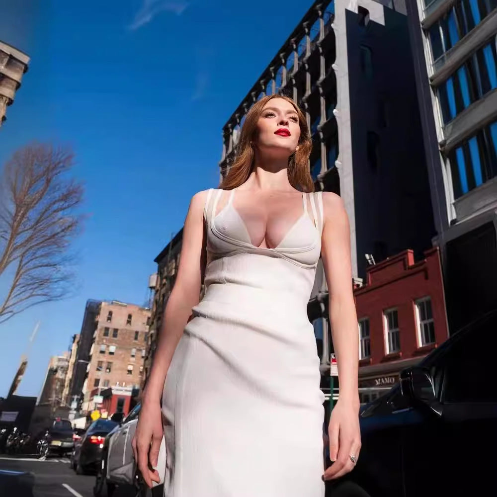 A long, fashionable and sexy bandage dress with a white strappy V-neck that shows the chest is slimming