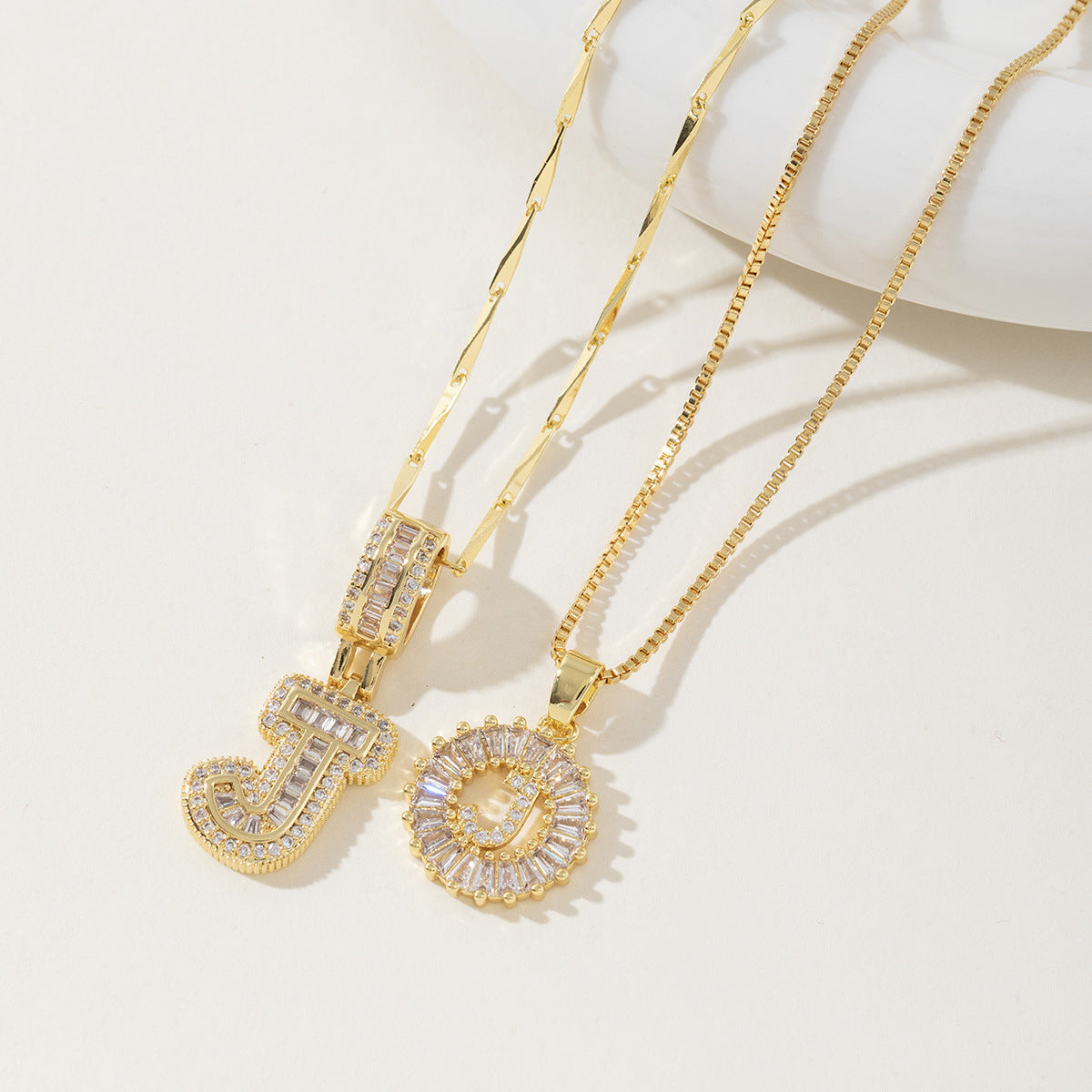 A 26-letter zirconia pendant inlaid with rock sugar copper
