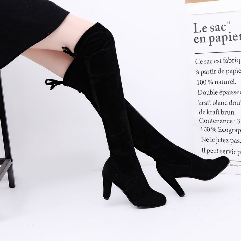 Above-knee boots with high heels