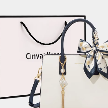 Hand-held shoulder-sling bag