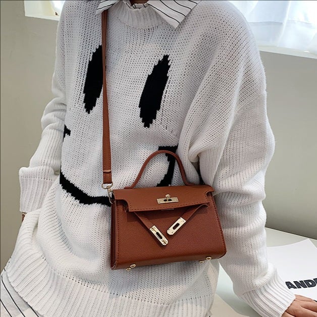 Hand-held crossbody bag