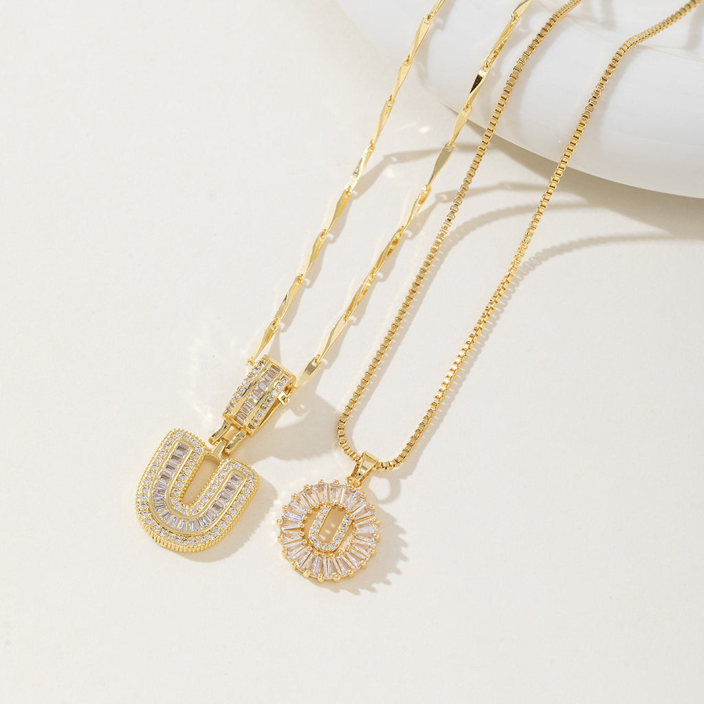 A 26-letter zirconia pendant inlaid with rock sugar copper