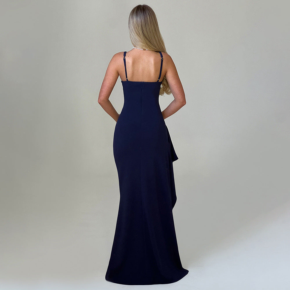 A sexy halter dress with a slim fit and ruffled deep V side slit