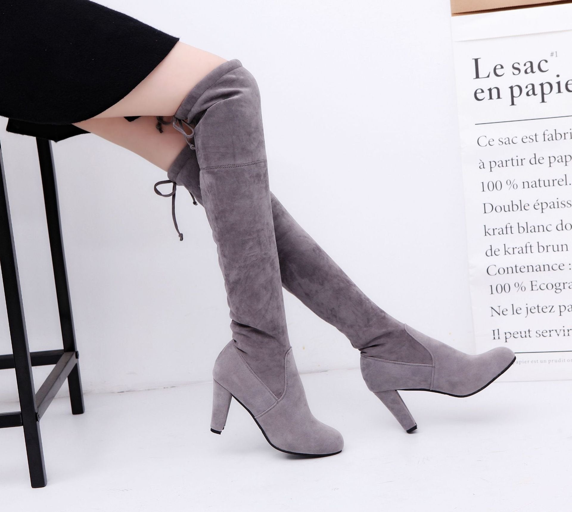 Above-knee boots with high heels