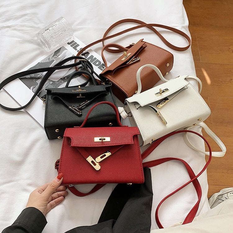 Hand-held crossbody bag
