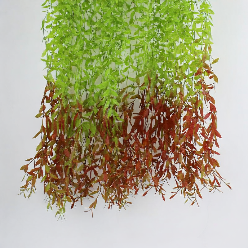Artificial willow leaves decorate willow twigs