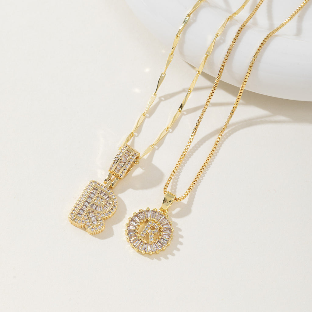 A 26-letter zirconia pendant inlaid with rock sugar copper