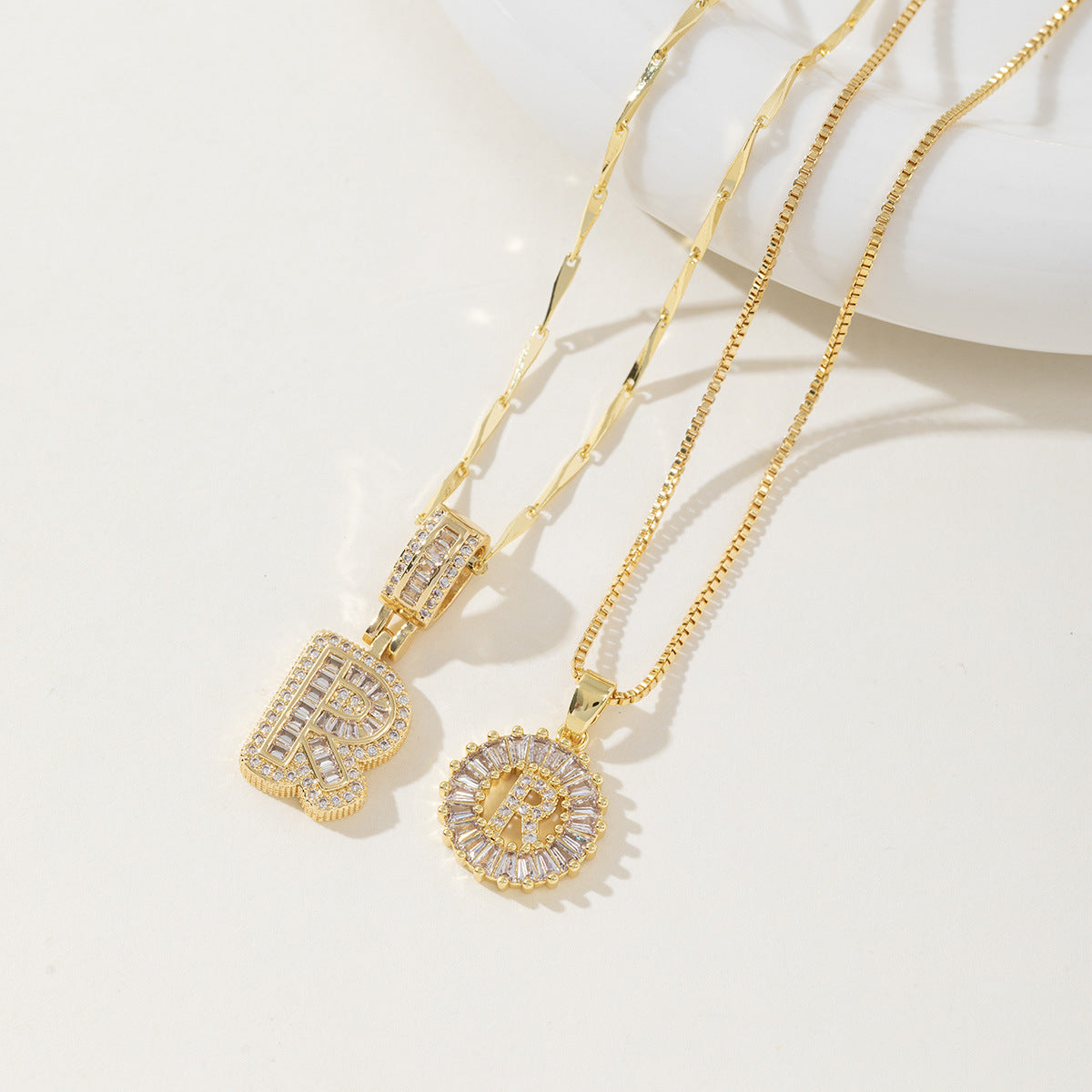 A 26-letter zirconia pendant inlaid with rock sugar copper