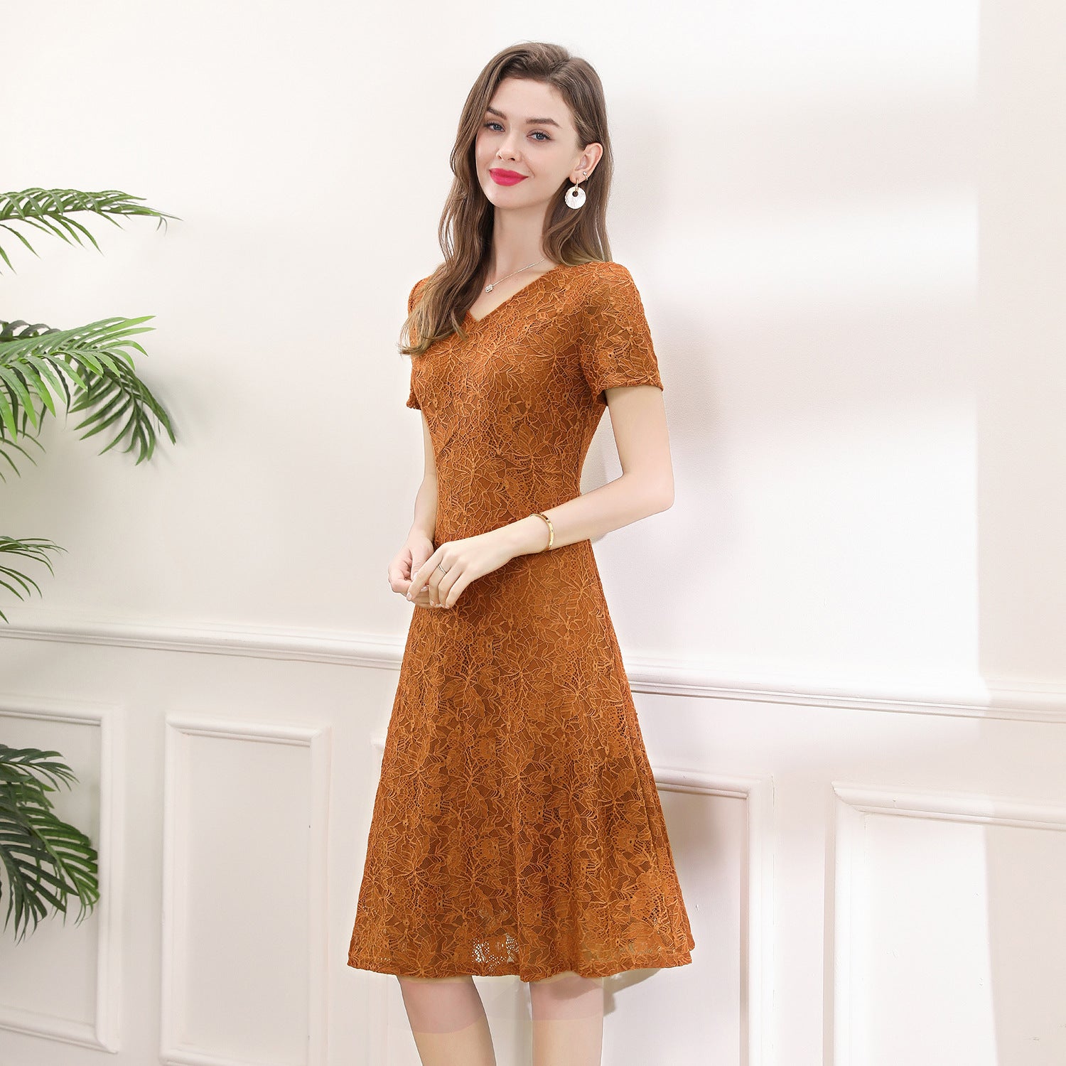 A figure-hugging lace dress