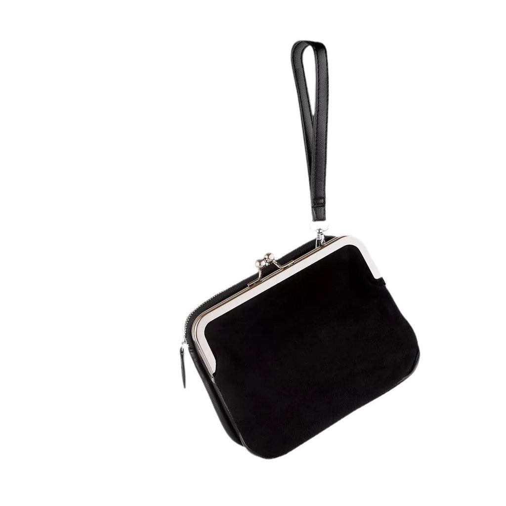 Carry a crossbody bag on one shoulder
