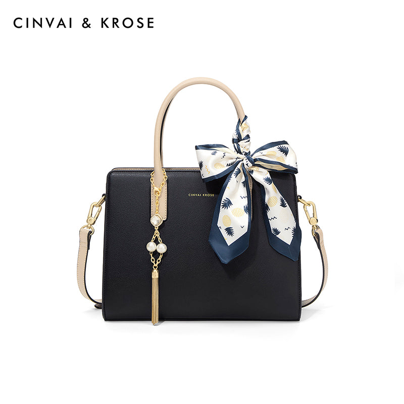 Hand-held shoulder-sling bag