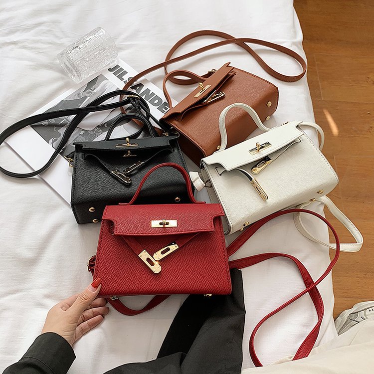 Hand-held crossbody bag