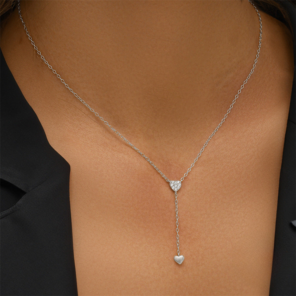 Pure silver tassel Y-shaped double-heart diamond-encrusted collarbone chain, a high-end and elegant necklace accessory