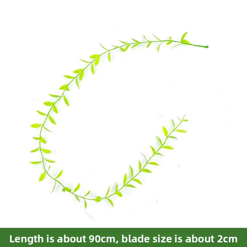 Artificial willow leaves decorate willow twigs